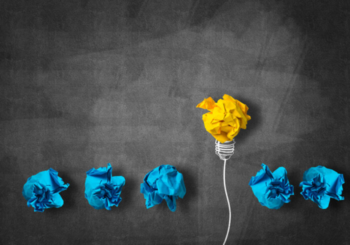 In search of great idea Inspiration concept with crumpled paper light bulb as good idea